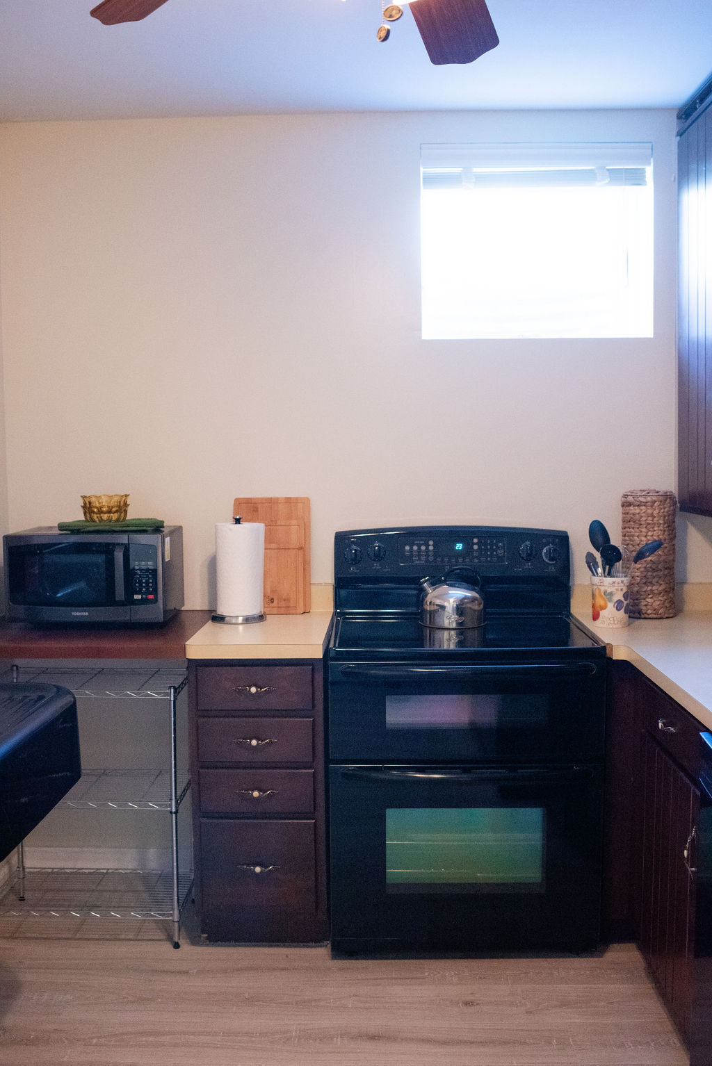 Kitchen with stove and microwave