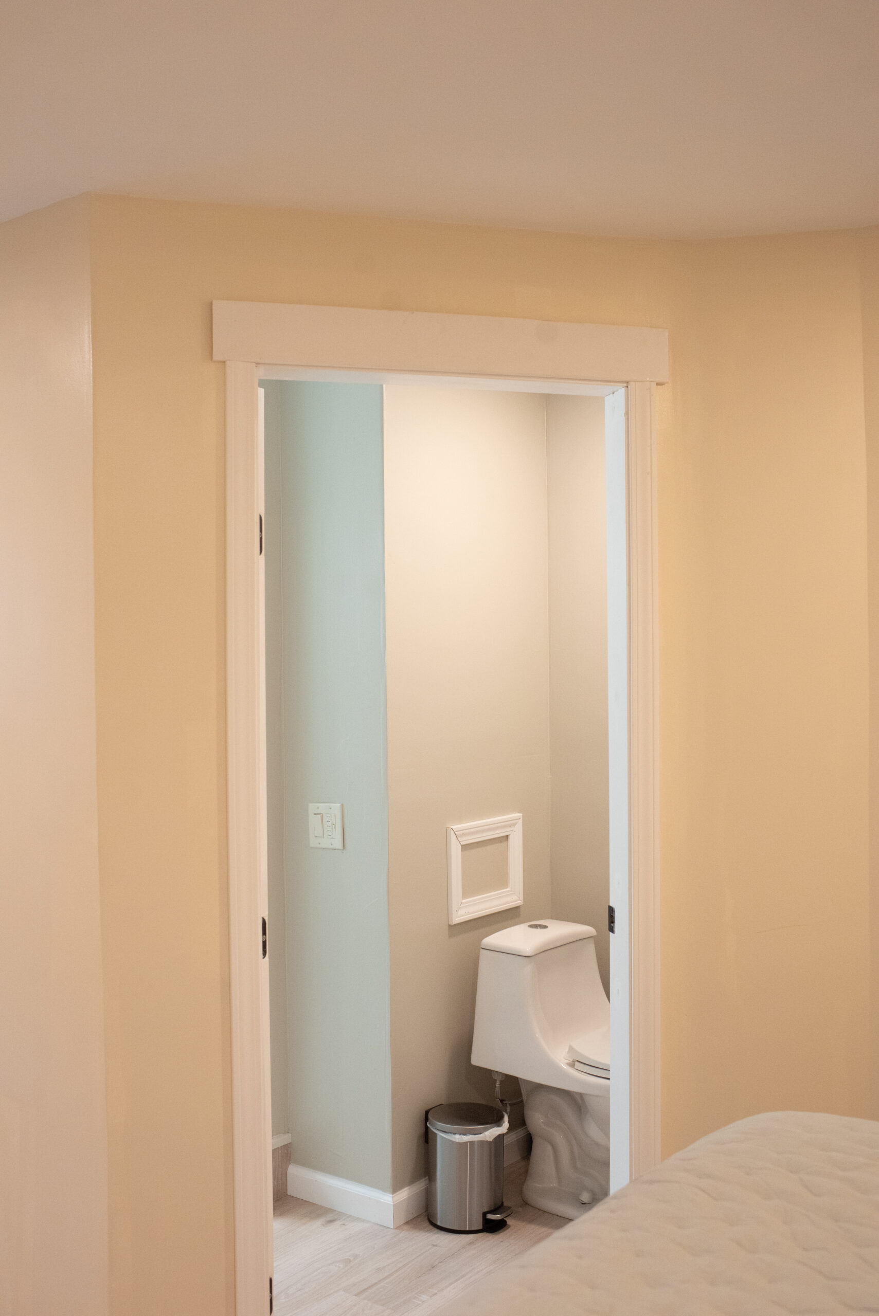 Primary bedroom to bathroom